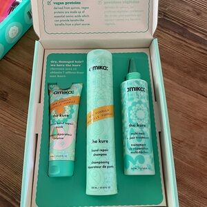 amika hair repair set in teal and coral